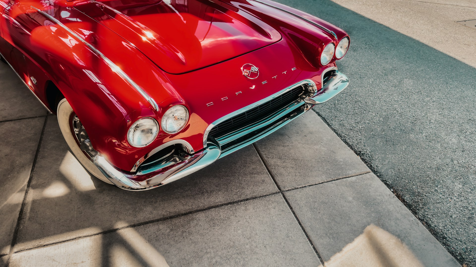a red car parked on the side of the road