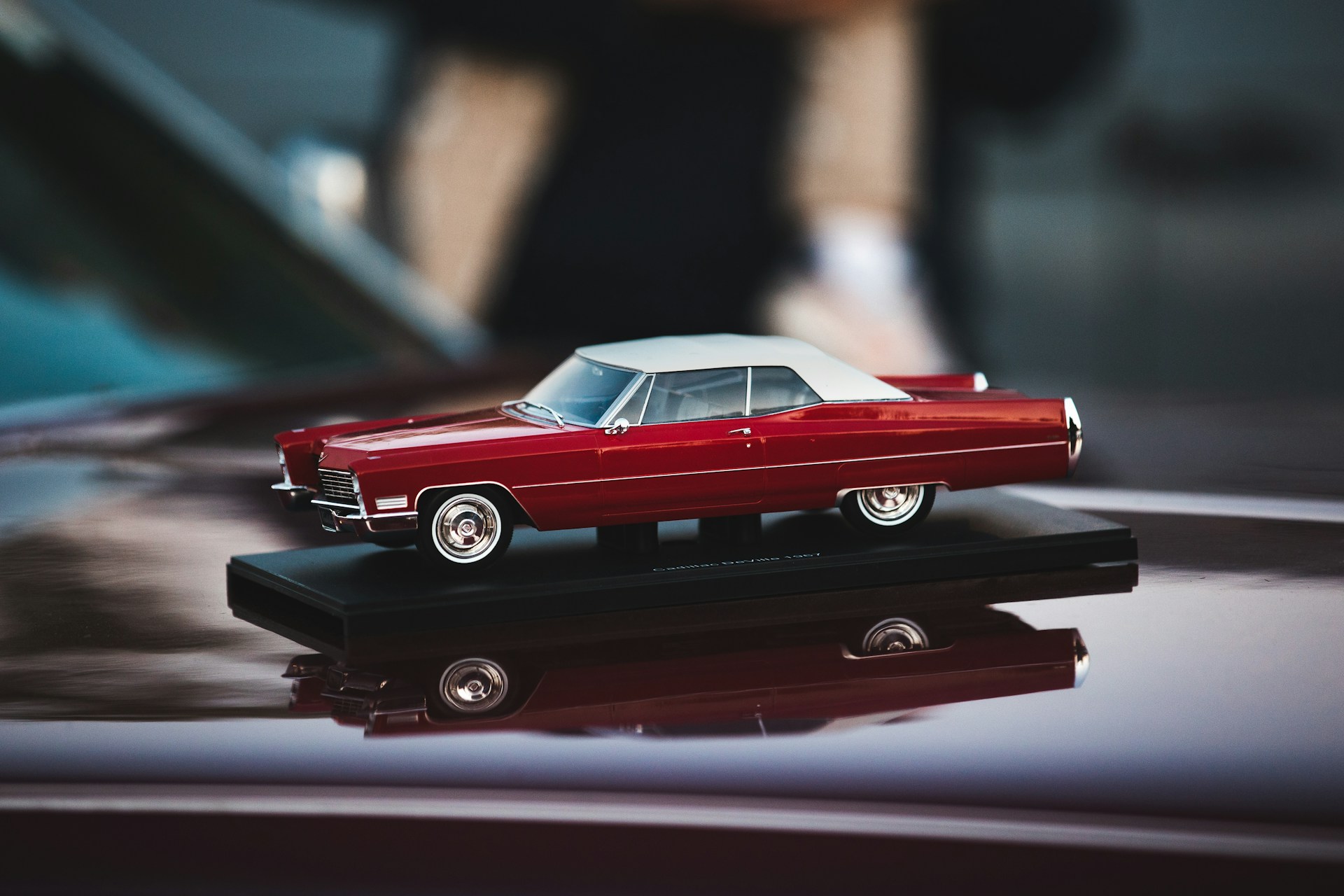 a toy car is sitting on top of a table